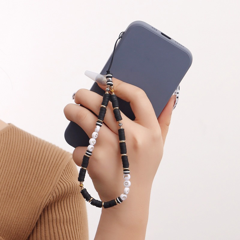 Women Accessories Picture - Catenella per telefono in argilla con